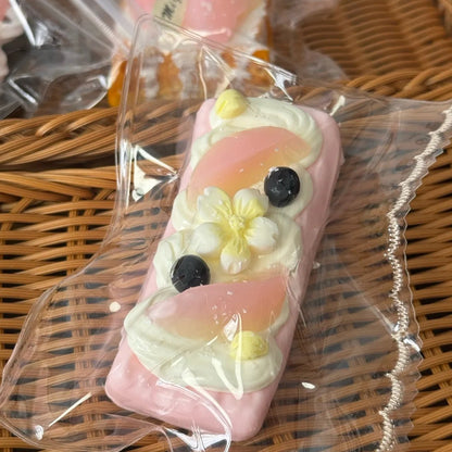 Peach Squishy Toys: Toast, Croissant, Donut & More - Psykade
